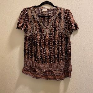 Never worn! Colorful patterned short sleeve size small